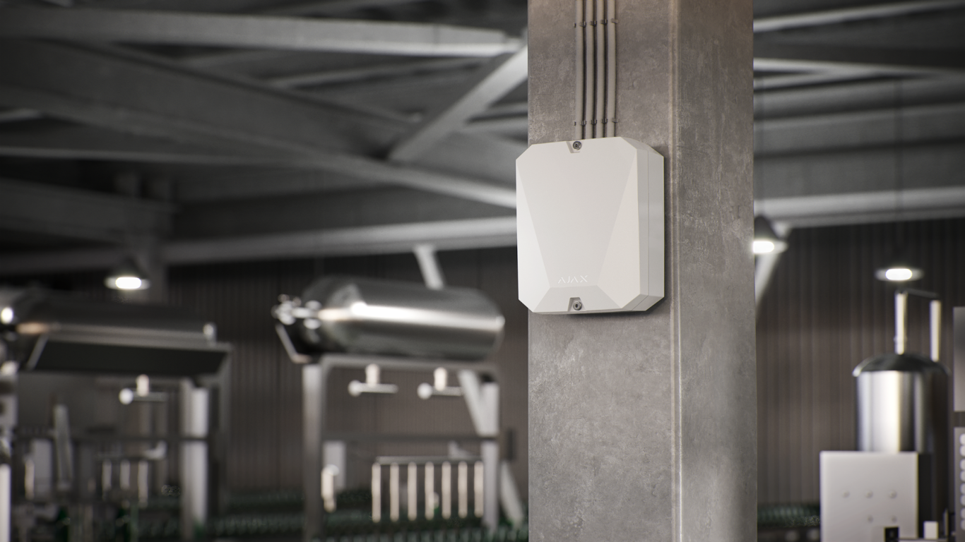 Vorschaubild Lagerhalle Weißes Gerät an einer Betonwand in einem modernen industriellen Umfeld.